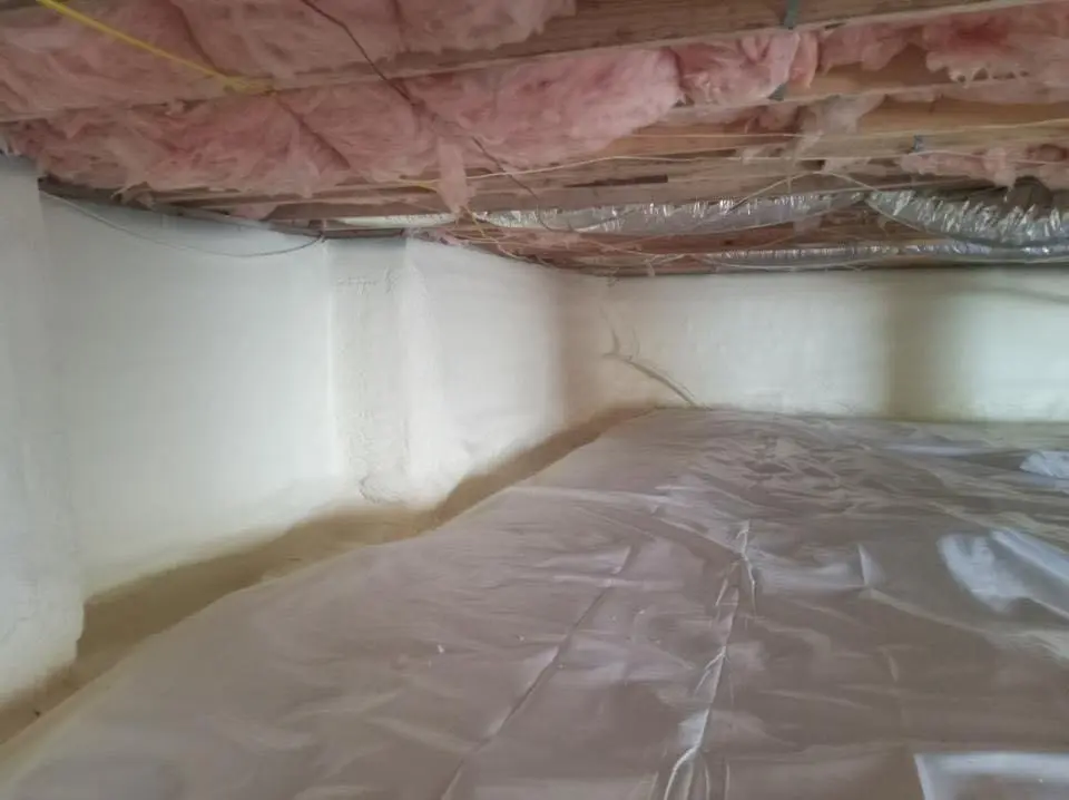 Crawl space encapsulation with closed-cell spray foam for Storm Damage Roof Repair in Bedford